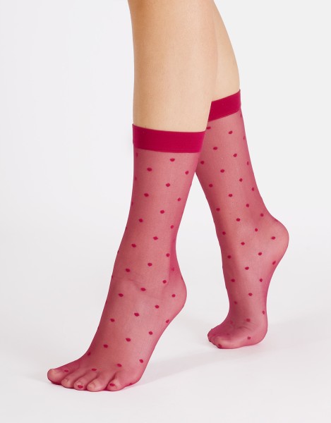 Cette - Sheer socks with a polka dot pattern