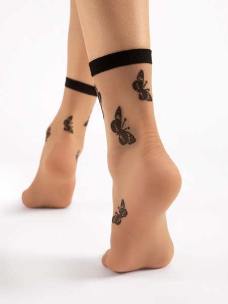 Fiore - Tunna sockor med ett vårliknande fjärilsmotiv, 15 DEN
