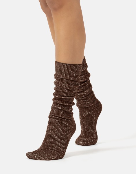 Cette - Comfortable, ribbed long socks with a loose top and lurex effect